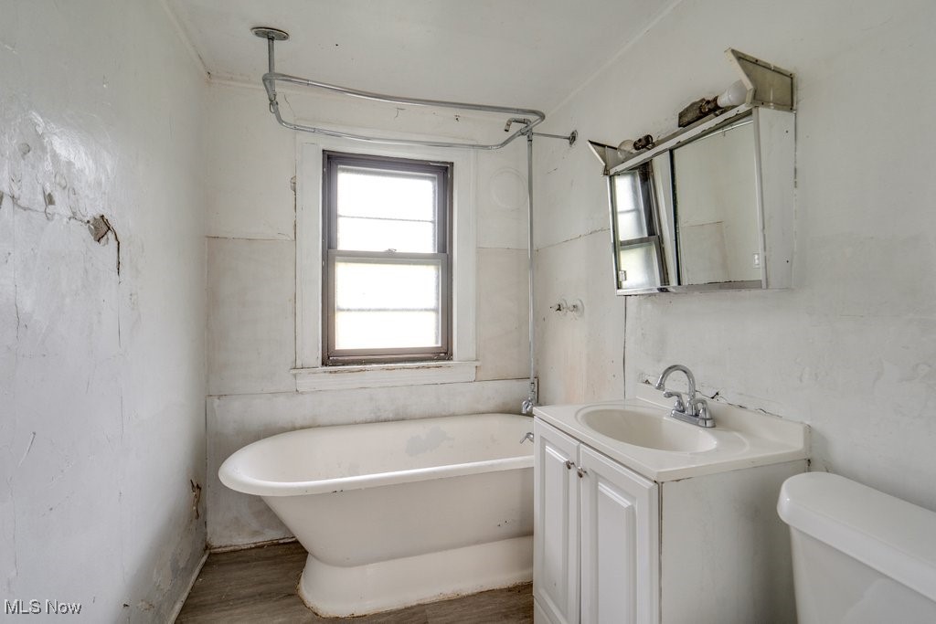 1618 Catalpa Road Cleveland, OH 44112 - Photo 6 of 33 Bathroom featuring vanity and wood finished floors