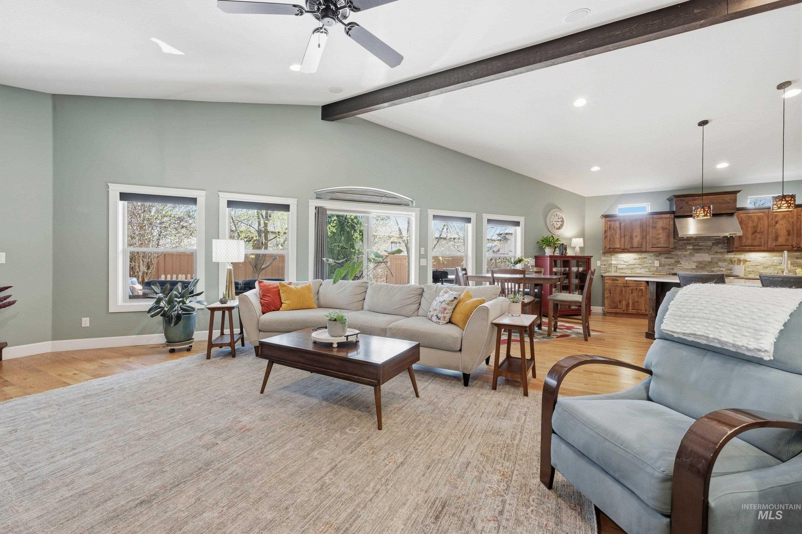 5850 North Rio Lomas Avenue Meridian, ID 83646 - Photo 15 of 50 Living room with light wood-style floors, plenty of natural light, a ceiling fan, and recessed lighting