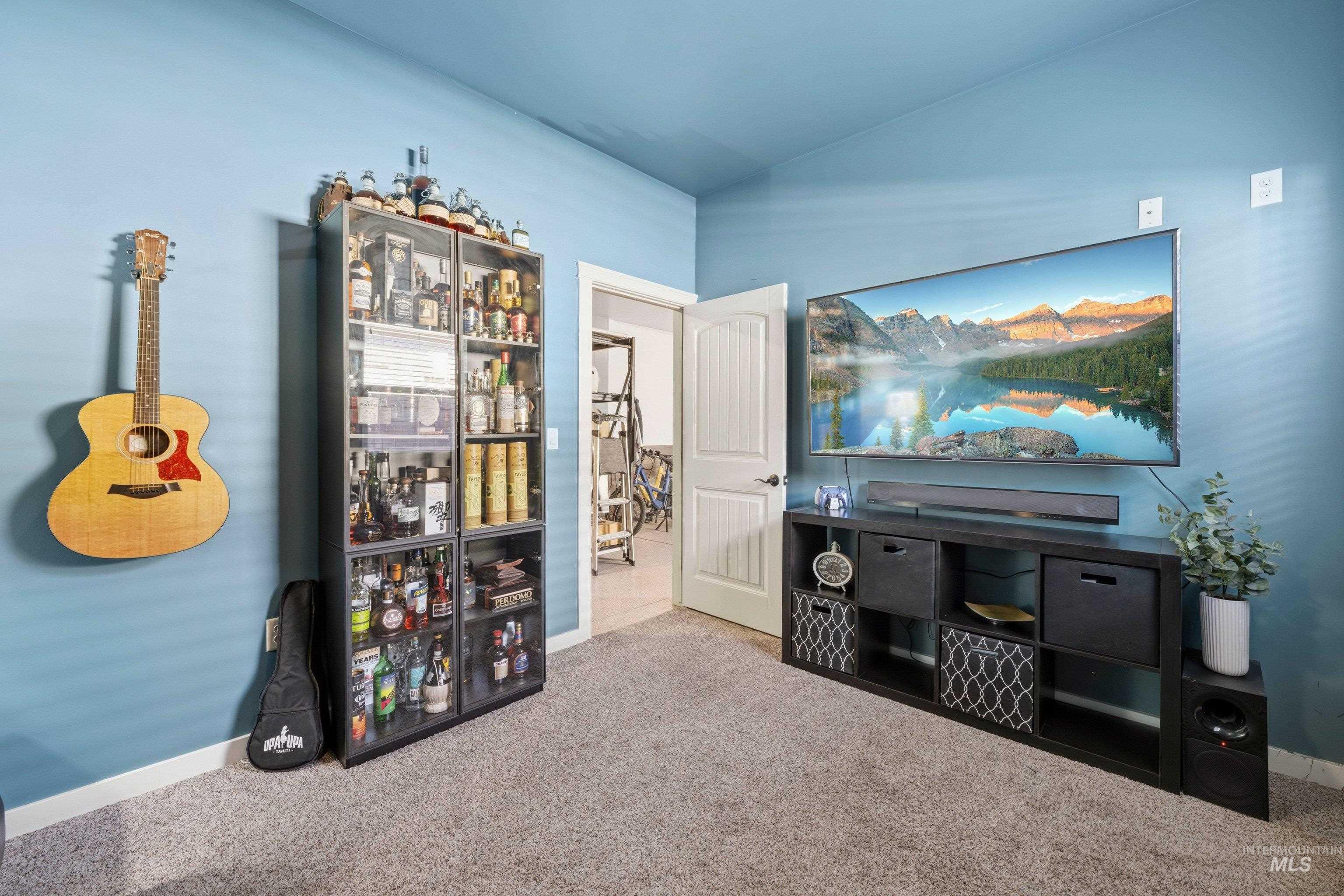 5850 North Rio Lomas Avenue Meridian, ID 83646 - Photo 33 of 50 Sitting room featuring carpet and baseboards