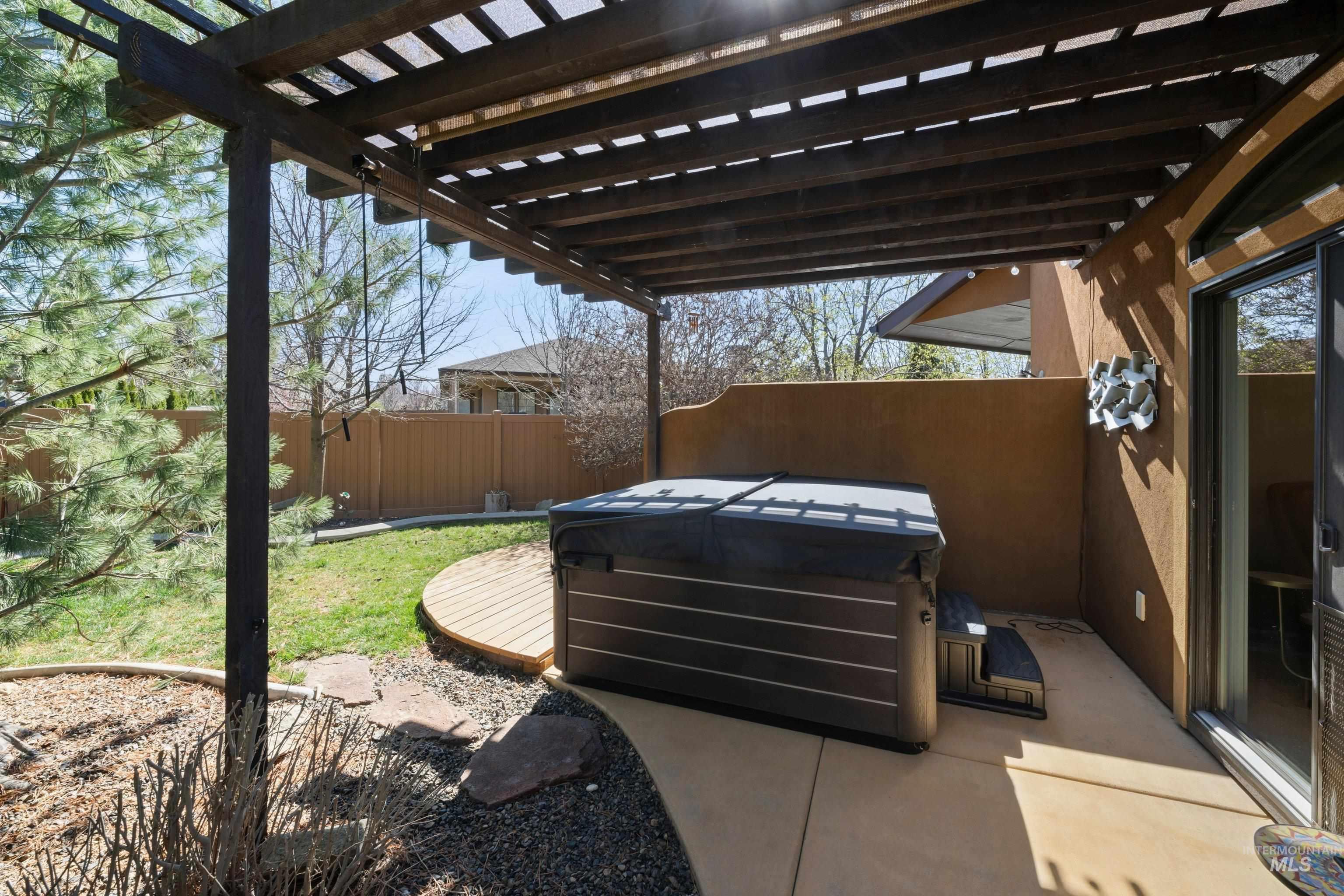 5850 North Rio Lomas Avenue Meridian, ID 83646 - Photo 36 of 50 Fenced backyard featuring a patio area and a pergola