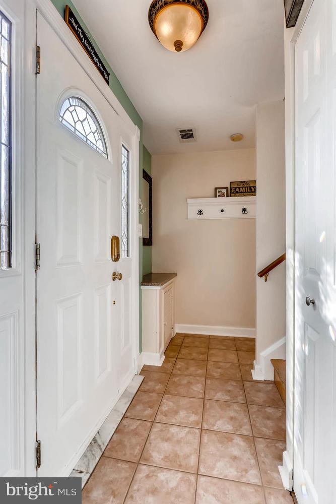 2406 Old Frederick Road Baltimore, MD 21228 - Photo 16 of 25 a view of a hallway to a bathroom