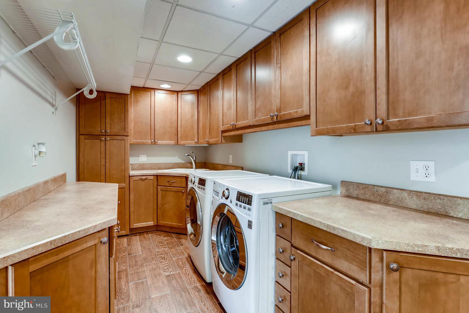 2406 Old Frederick Road Baltimore, MD 21228 - Photo 20 of 25 a utility room with dryer and washer