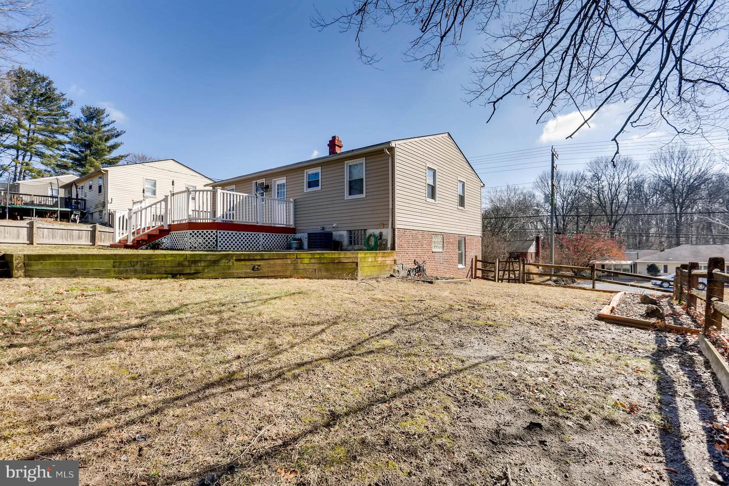 2406 Old Frederick Road Baltimore, MD 21228 - Photo 23 of 25 a house view with a swimming pool