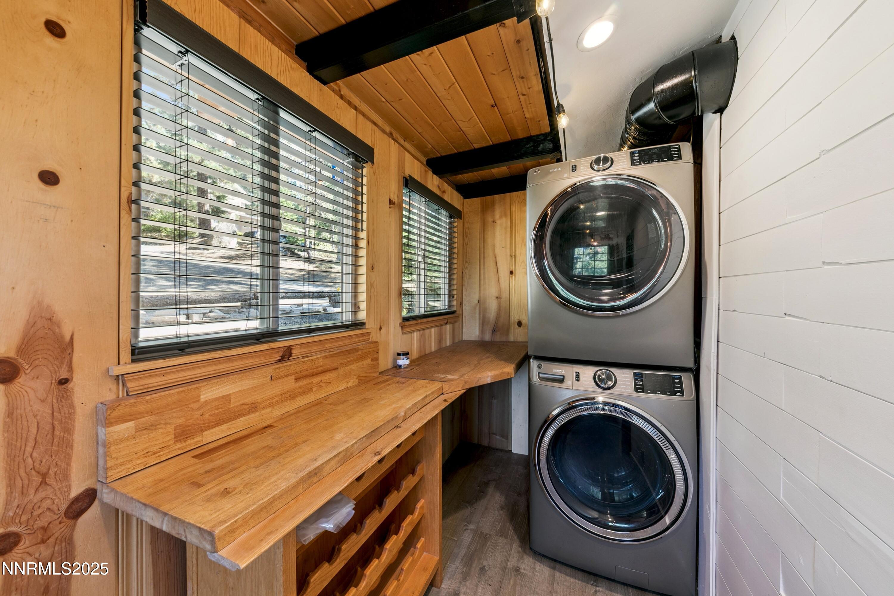 150 Woodland Way Stateline, NV 89449 - Photo 15 of 22 a view of a storage and utility room with washing machine