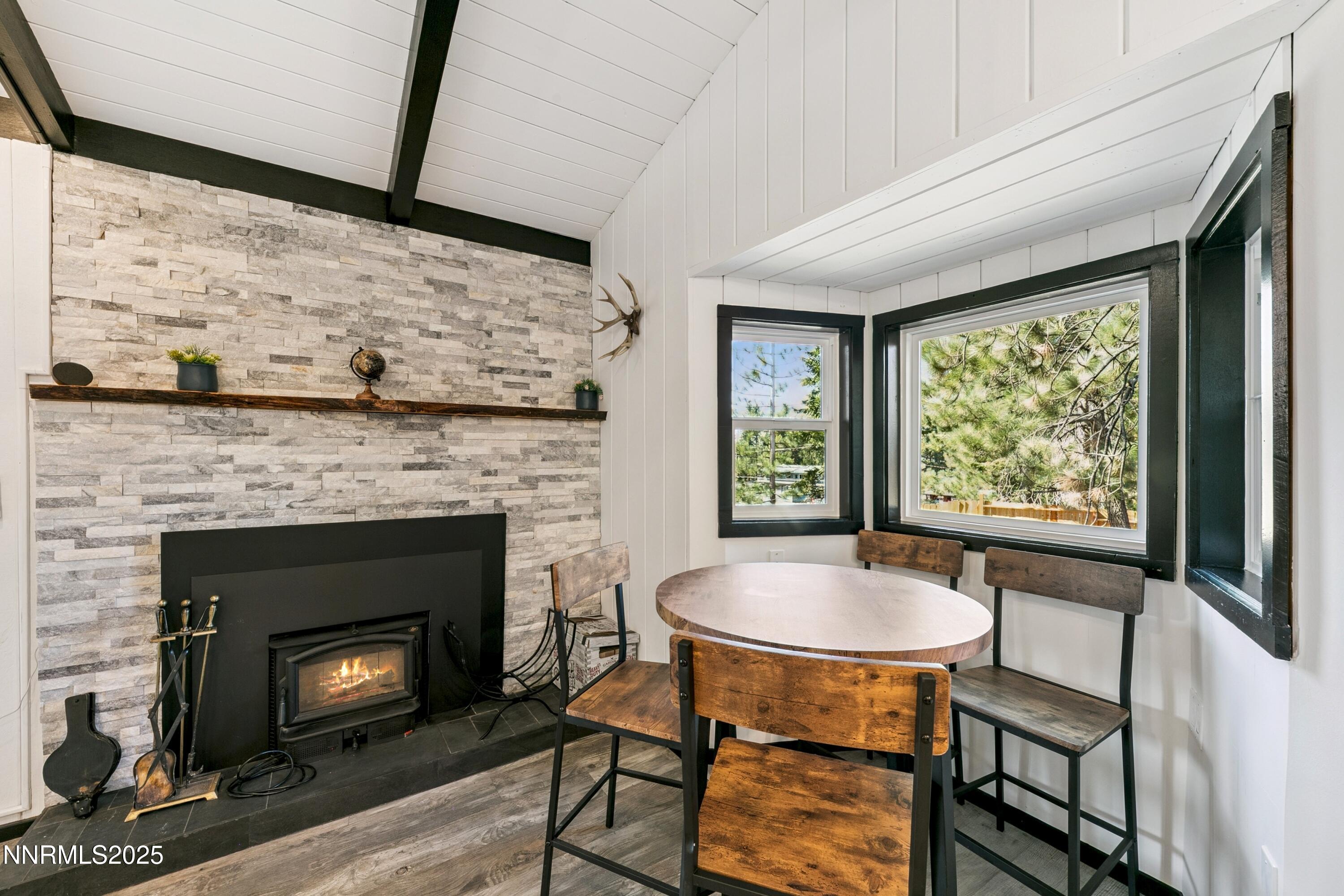 150 Woodland Way Stateline, NV 89449 - Photo 4 of 22 a living room with furniture and a fireplace