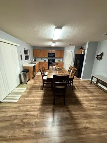 a room with furniture and a wooden floor