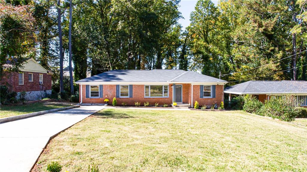 709 Farrar Court Decatur, GA 30032 - Photo 1 of 1 a front view of a house with yard