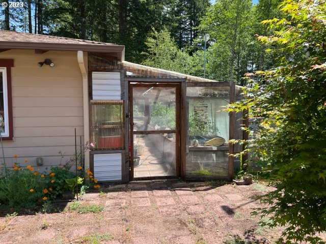 97313 Stagecoach Road Brookings, OR 97415 - Photo 44 of 44 a backyard of a house with seating space
