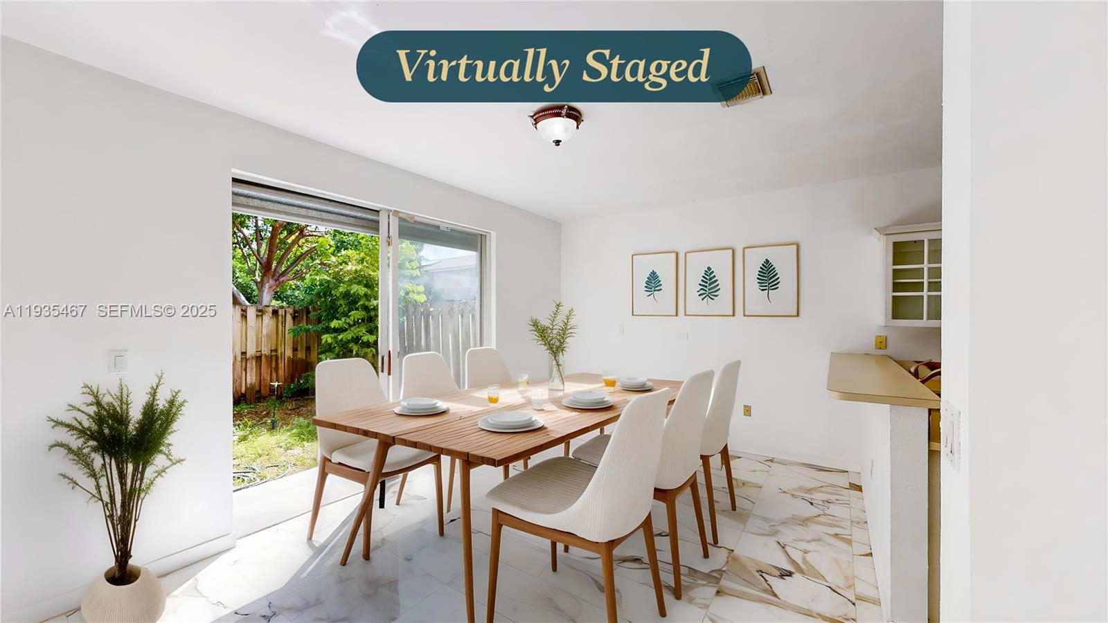 27345 Southwest 138th Court Homestead, FL 33032 - Photo 11 of 75 a table that has a table and a chair with wooden floor