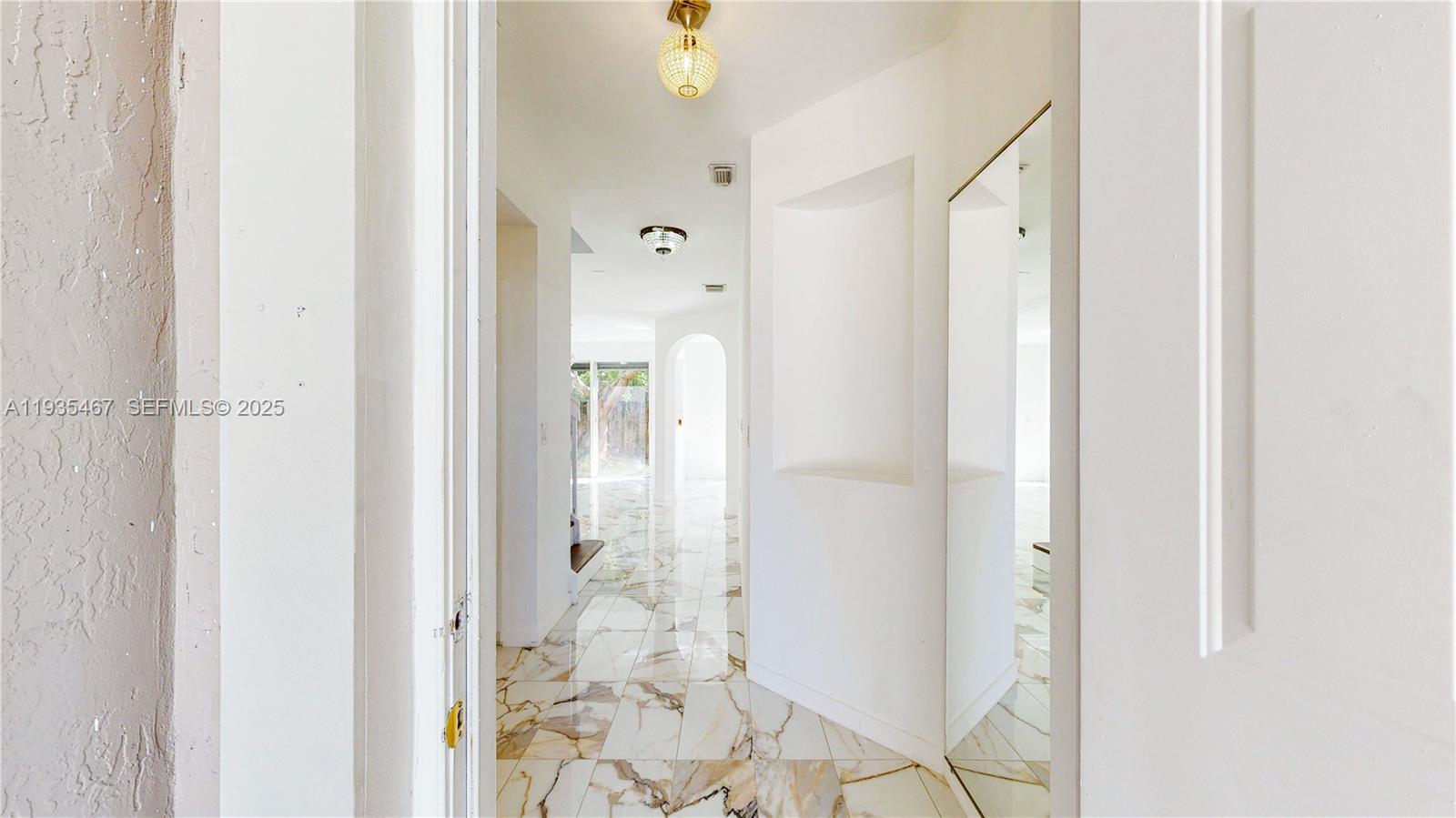 27345 Southwest 138th Court Homestead, FL 33032 - Photo 19 of 75 a bathroom with a shower and a glass door
