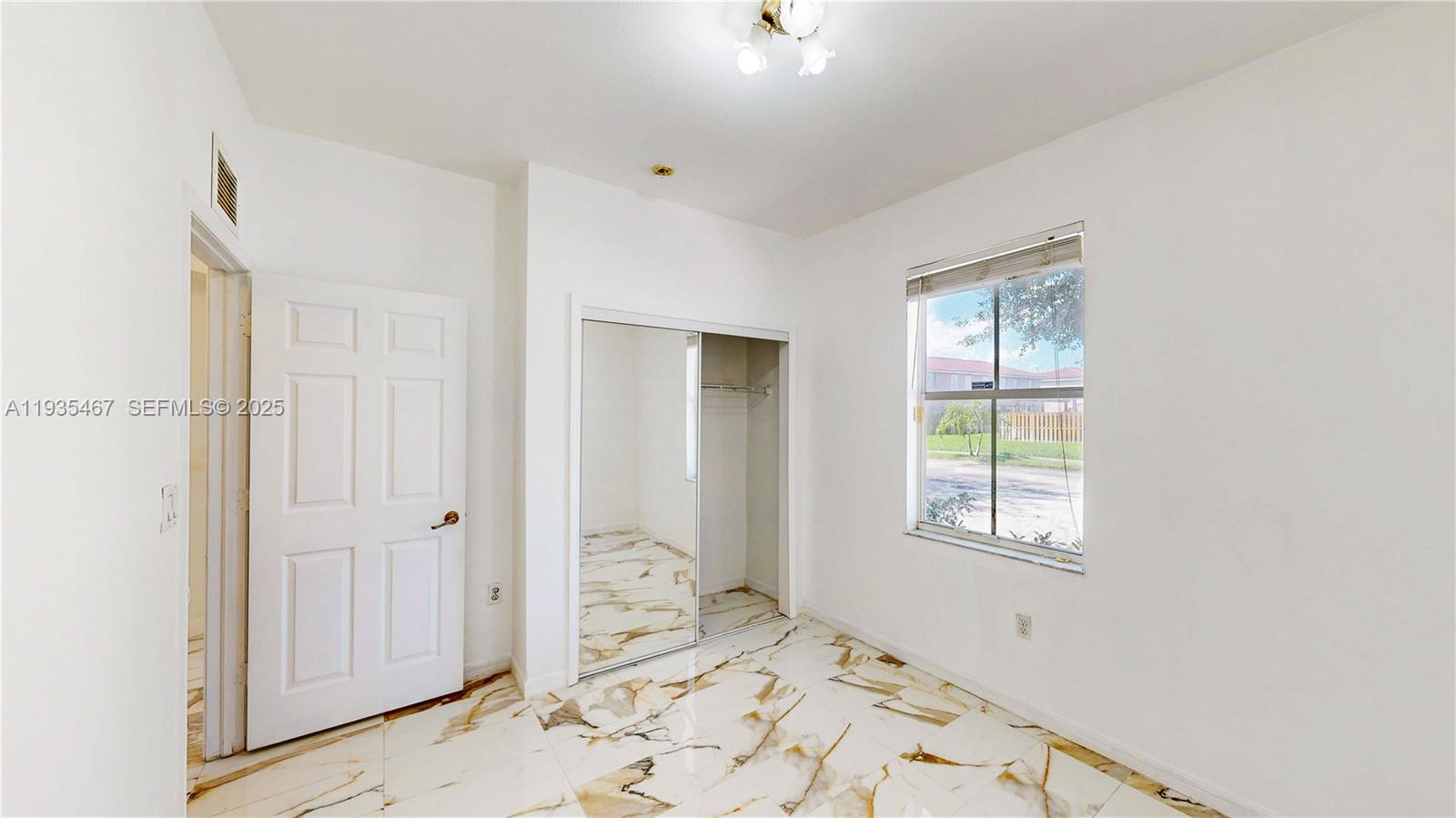 27345 Southwest 138th Court Homestead, FL 33032 - Photo 21 of 75 a view of a interior in the house