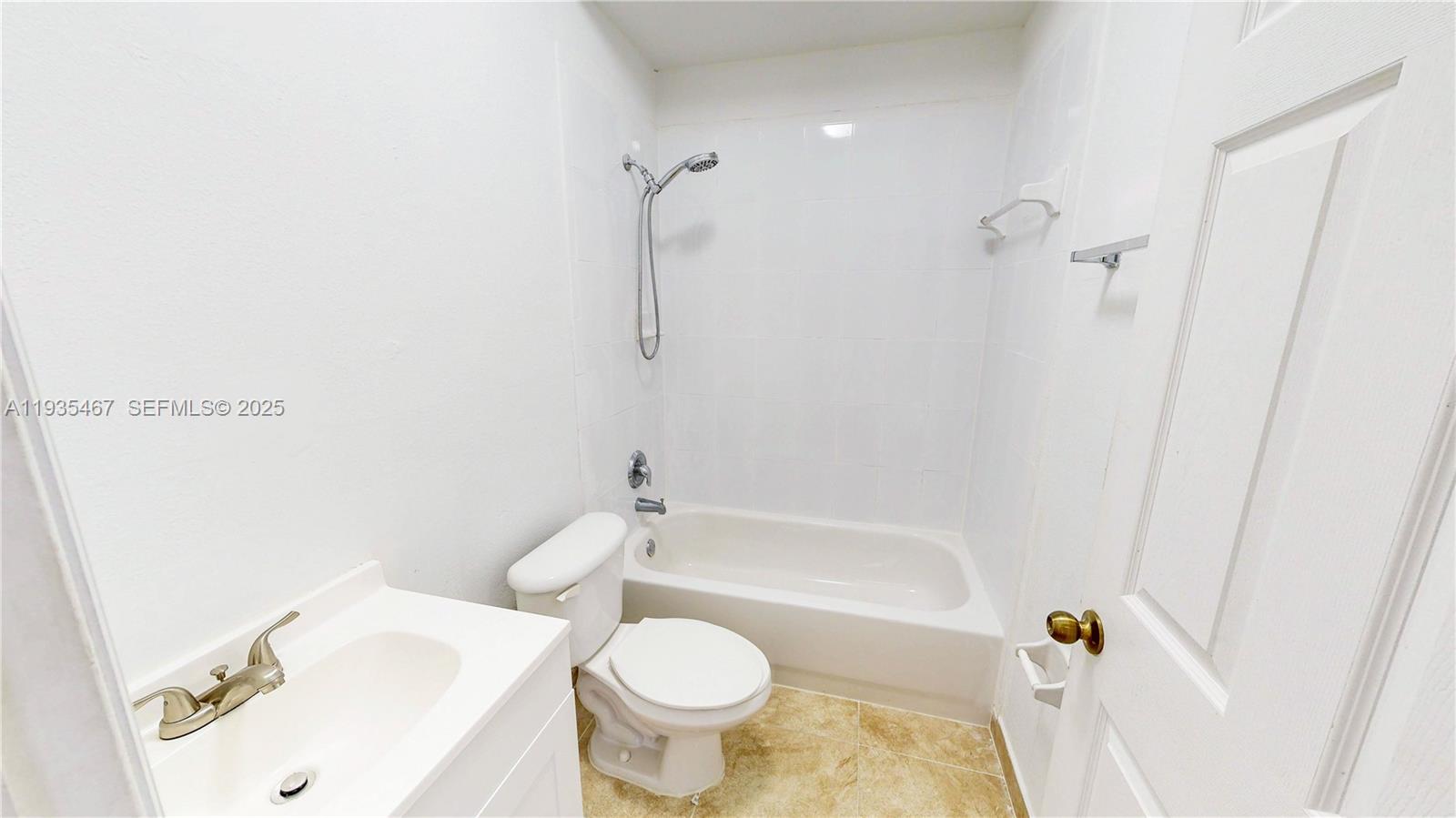 27345 Southwest 138th Court Homestead, FL 33032 - Photo 45 of 75 a bathroom with a sink toilet and shower