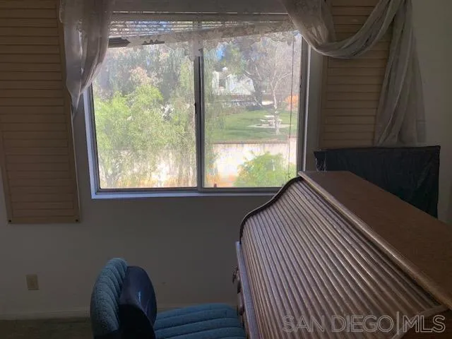 43982 Highlander Drive Temecula, CA 92592 - Photo 11 of 14 a bedroom with a bed and a window