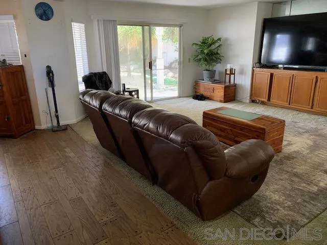 43982 Highlander Drive Temecula, CA 92592 - Photo 4 of 14 a living room with furniture and a flat screen tv
