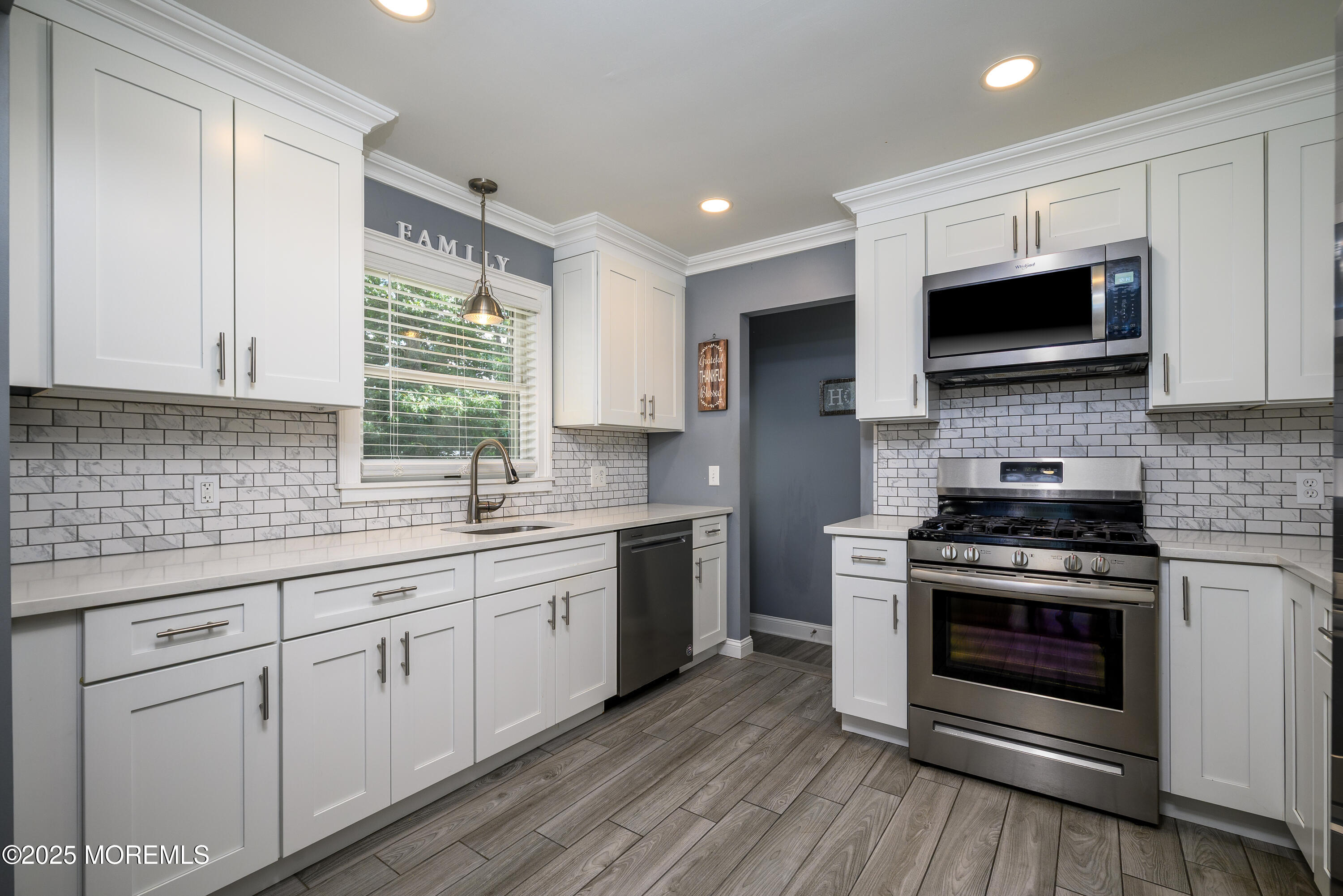 3213 Ridgewood Road Allenwood, NJ 08720 - Photo 13 of 42 a kitchen with stainless steel appliances granite countertop a stove and a sink