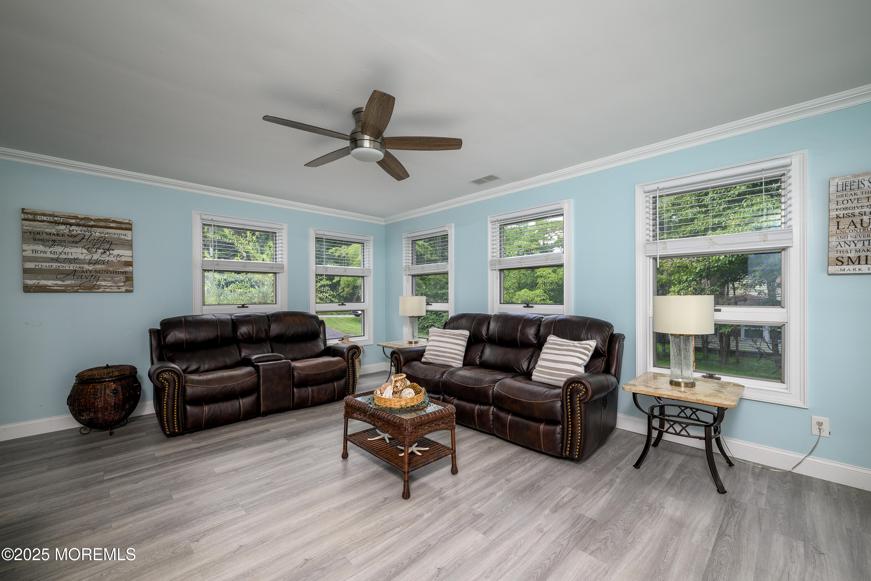 3213 Ridgewood Road Allenwood, NJ 08720 - Photo 19 of 42 a living room with furniture a window and a wooden floor