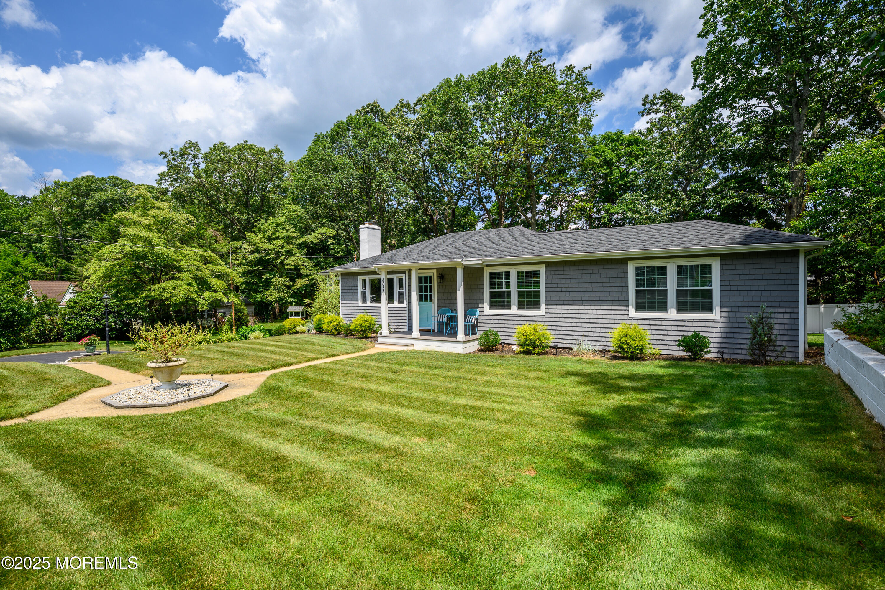 3213 Ridgewood Road Allenwood, NJ 08720 - Photo 2 of 42 a front view of house with yard outdoor seating and green space