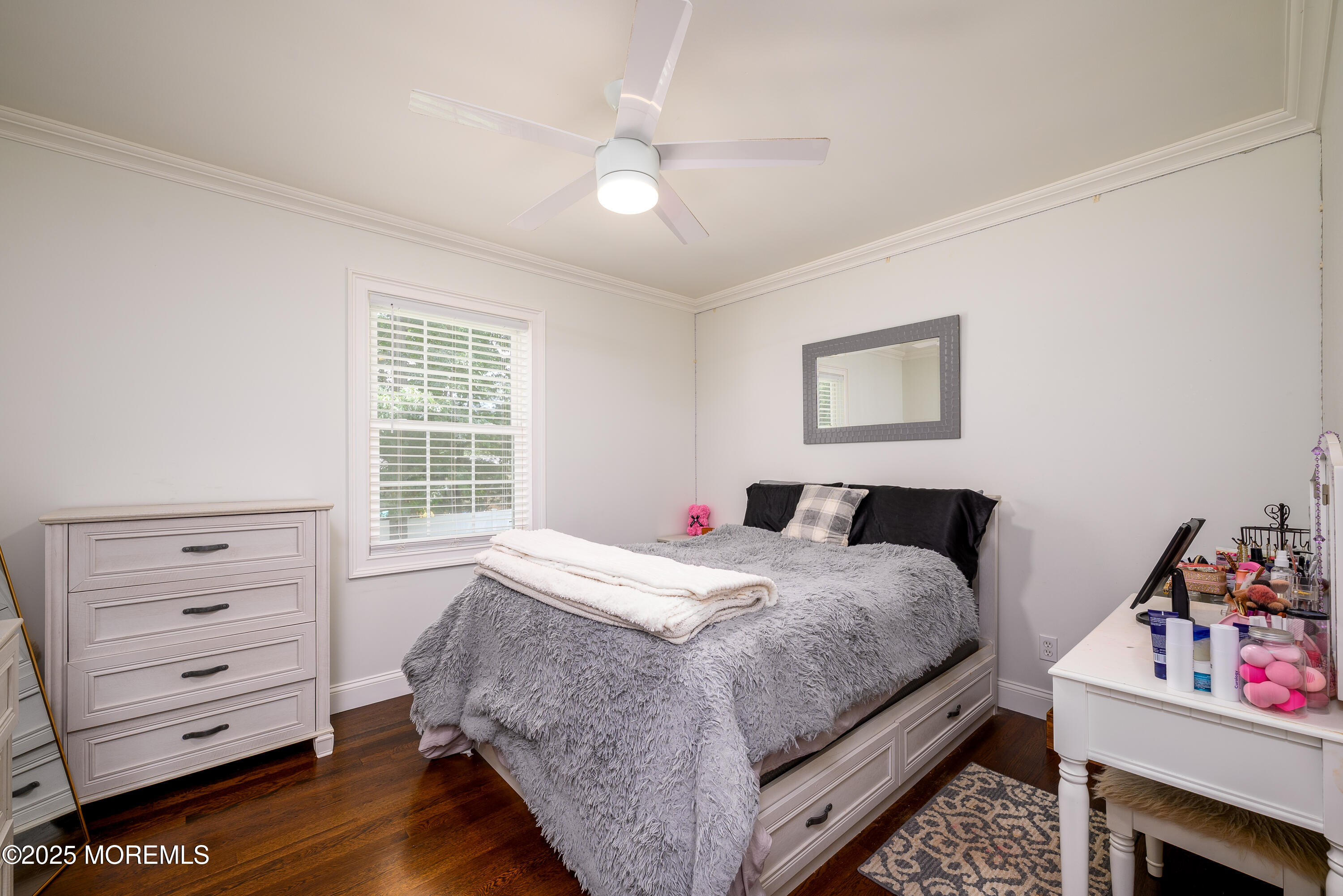 3213 Ridgewood Road Allenwood, NJ 08720 - Photo 23 of 42 a bedroom with a bed and a dresser