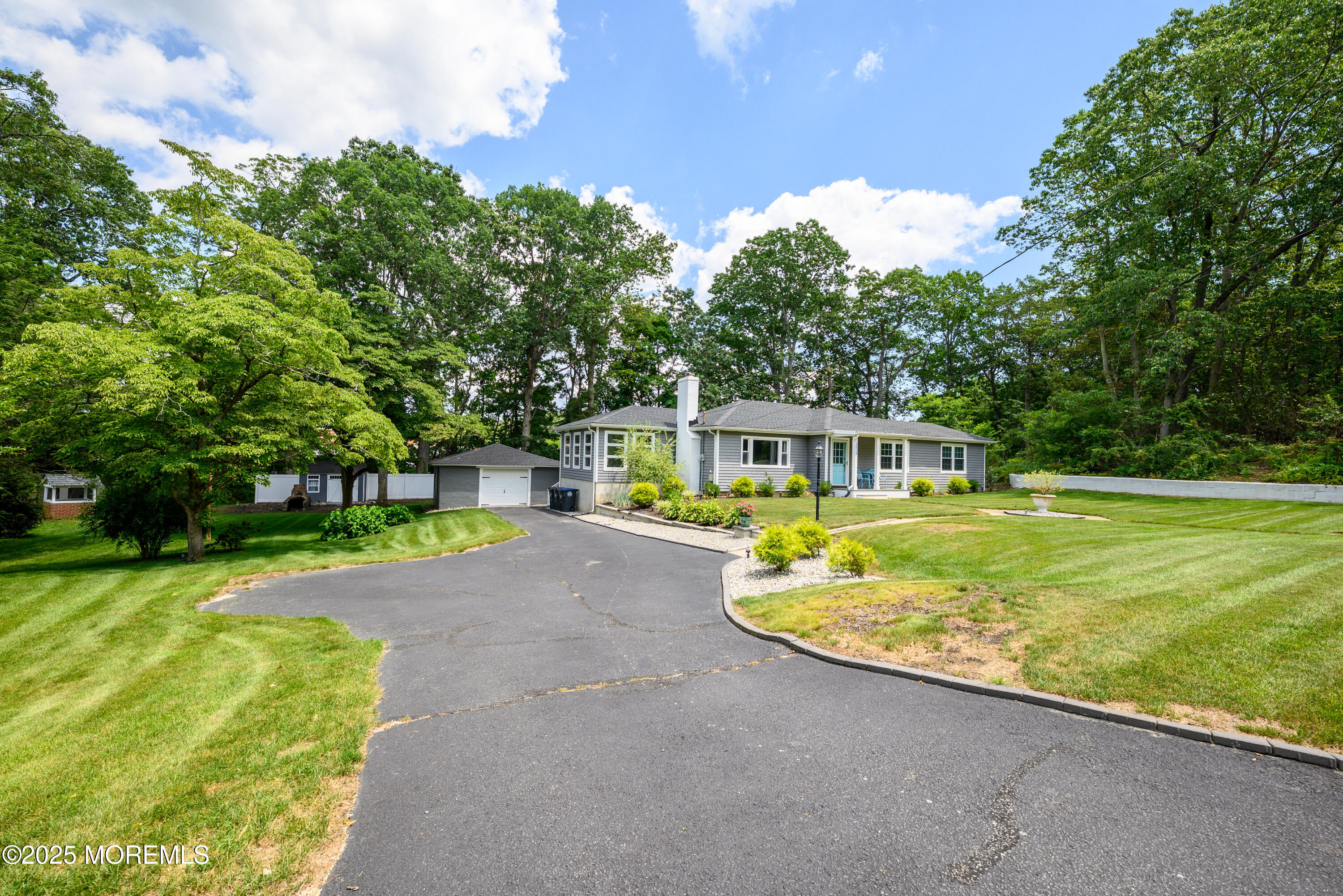 3213 Ridgewood Road Allenwood, NJ 08720 - Photo 3 of 42 a view of a house with swimming pool and a yard