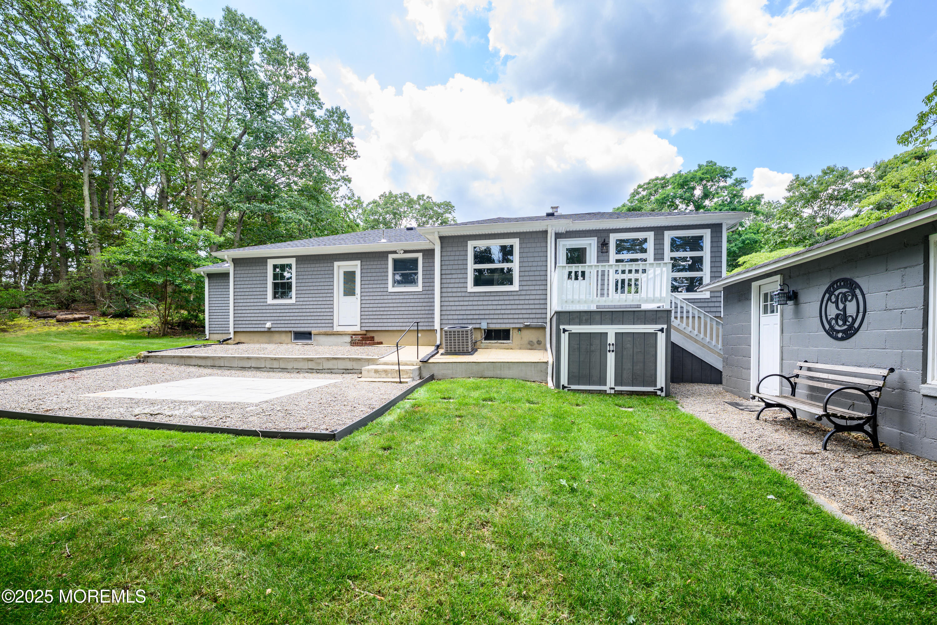 3213 Ridgewood Road Allenwood, NJ 08720 - Photo 38 of 42 a front view of house with yard and outdoor seating
