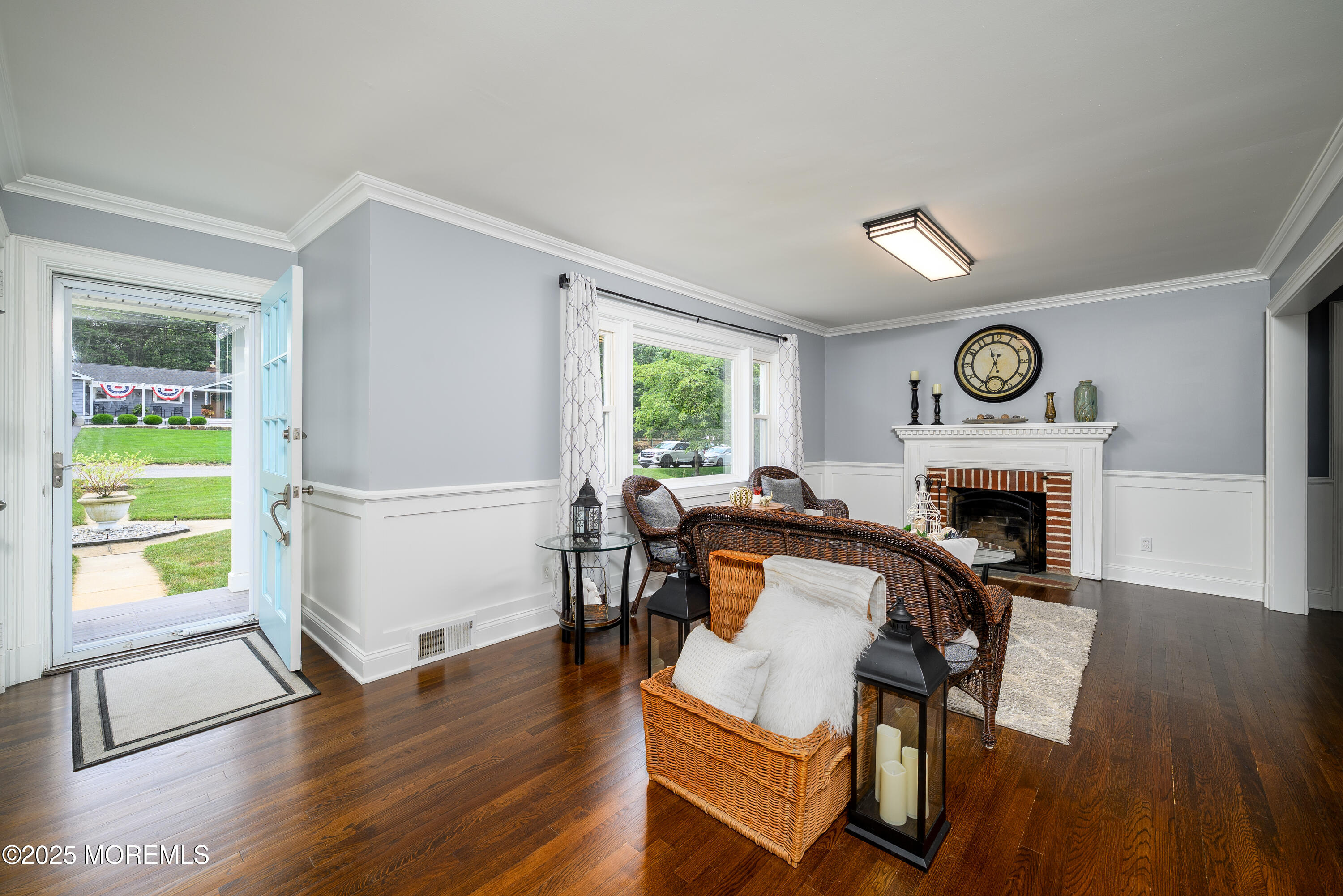 3213 Ridgewood Road Allenwood, NJ 08720 - Photo 8 of 42 a living room with furniture and a fireplace