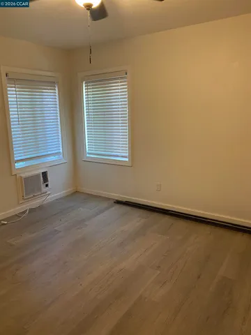 a view of a room with drop ceiling