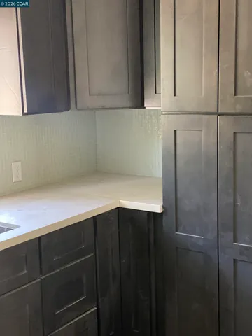 an entryway with wooden floor