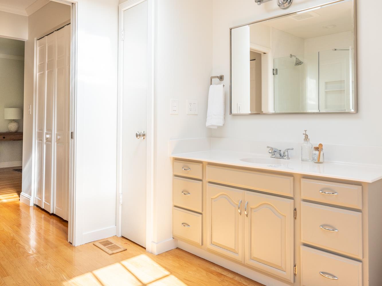 802 Covington Road Belmont, CA 94002 - Photo 15 of 28 a bathroom with a sink and a mirror