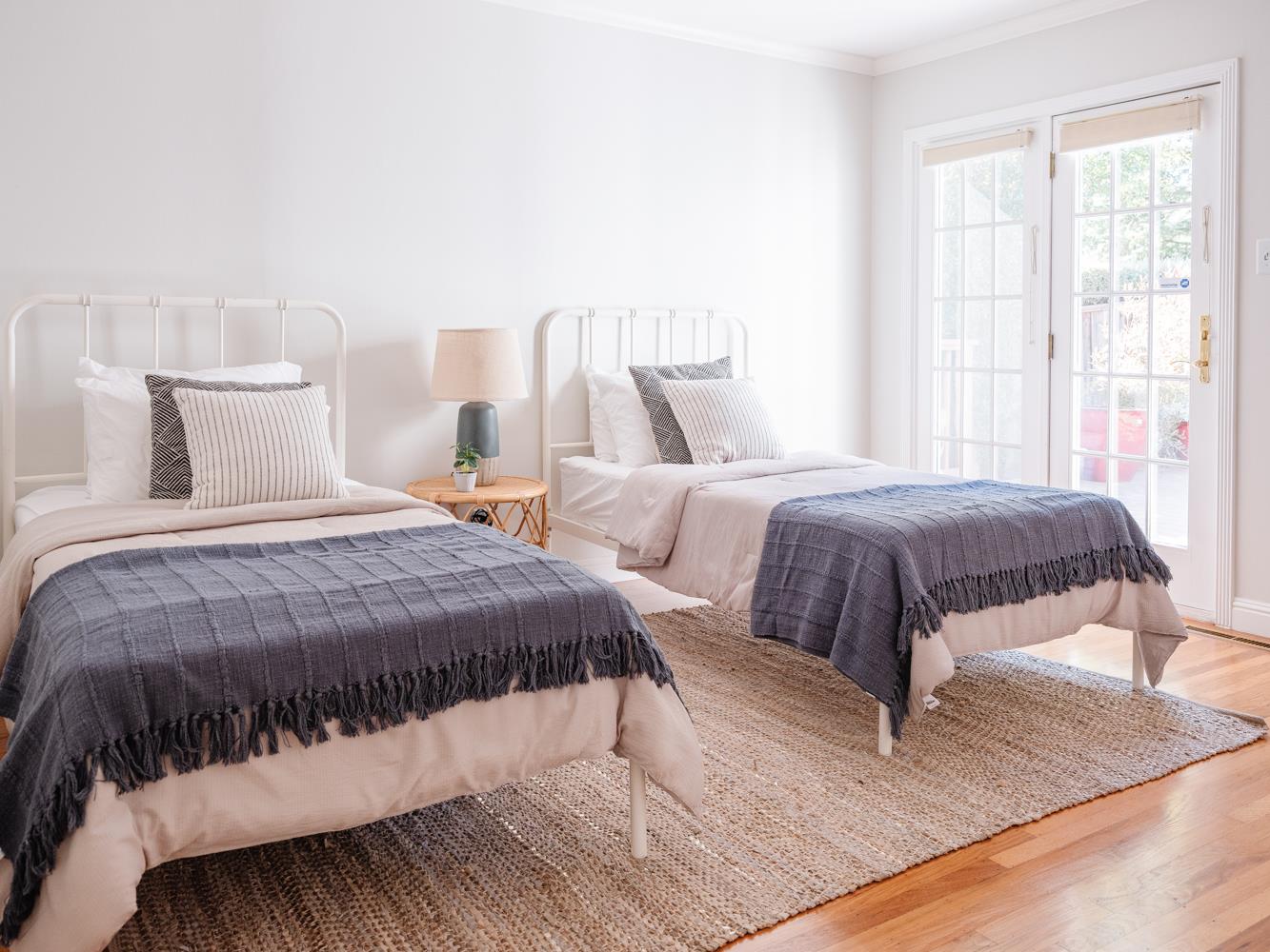 802 Covington Road Belmont, CA 94002 - Photo 16 of 28 a bedroom with a bed and a night stand