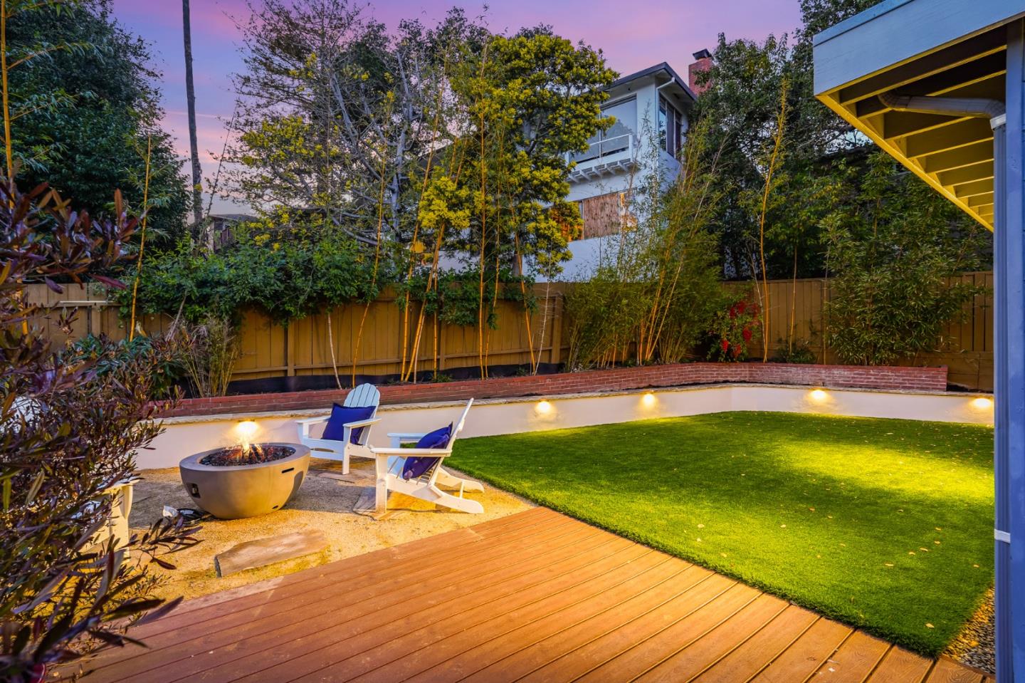 802 Covington Road Belmont, CA 94002 - Photo 24 of 28 a view of a swimming pool with a lounge chair and palm trees
