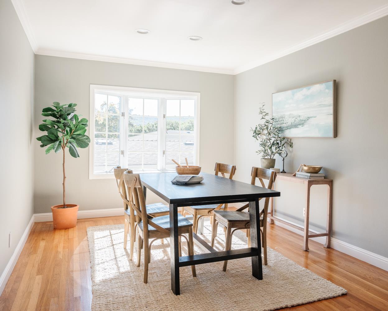 802 Covington Road Belmont, CA 94002 - Photo 7 of 28 a view of a dining room with furniture and wooden floor