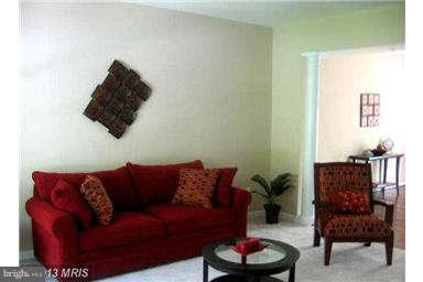 5518 Deale Churchton Road Churchton, MD 20733 - Photo 5 of 11 a living room with furniture and a wooden floor