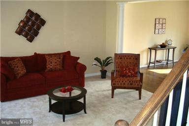 5518 Deale Churchton Road Churchton, MD 20733 - Photo 6 of 11 a living room with furniture and a rug