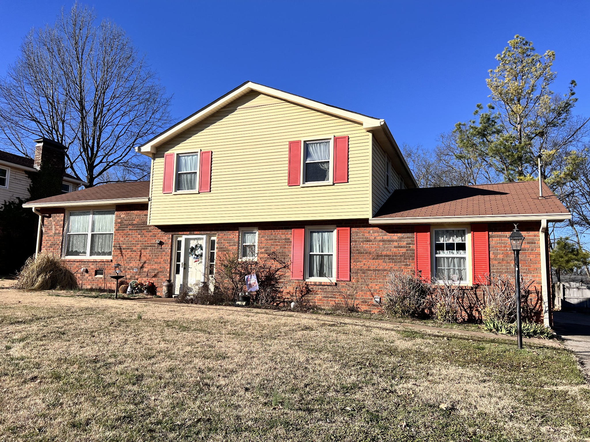 2950 Anderson Road Nashville, TN 37217 - Photo 1 of 2 a front view of a house with garden