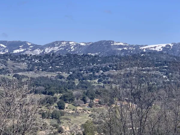 a view of city and mountain