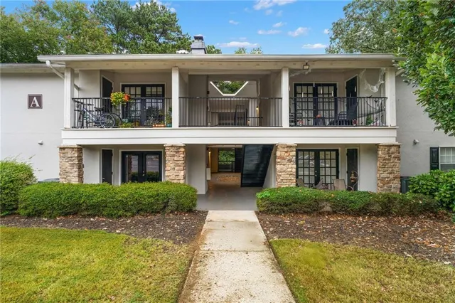 a view of a swimming pool with a lounge chairs