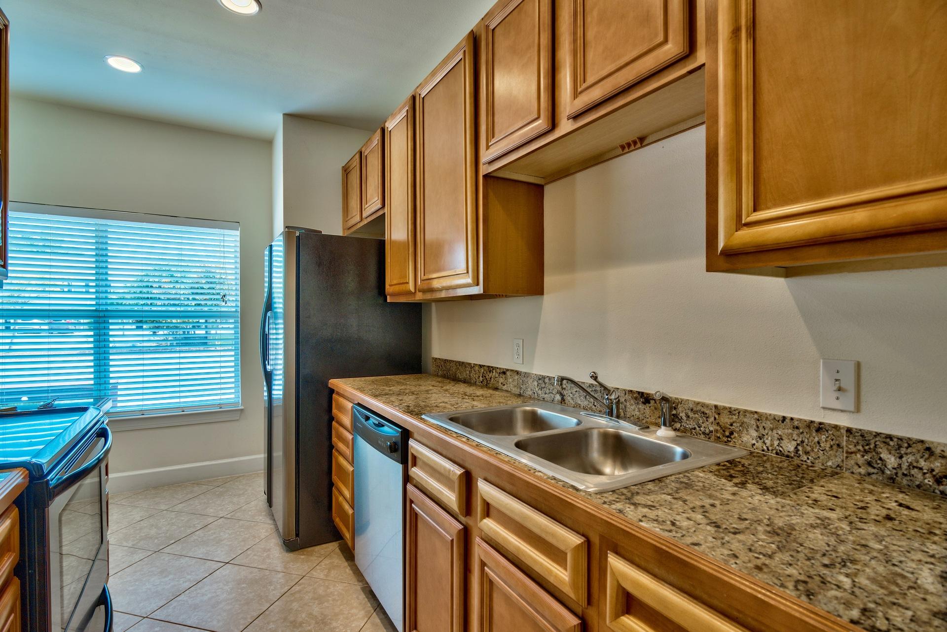 15284 331 Business, Unit 5A Freeport, FL 32439 - Photo 9 of 31 a kitchen that has a sink and a stove