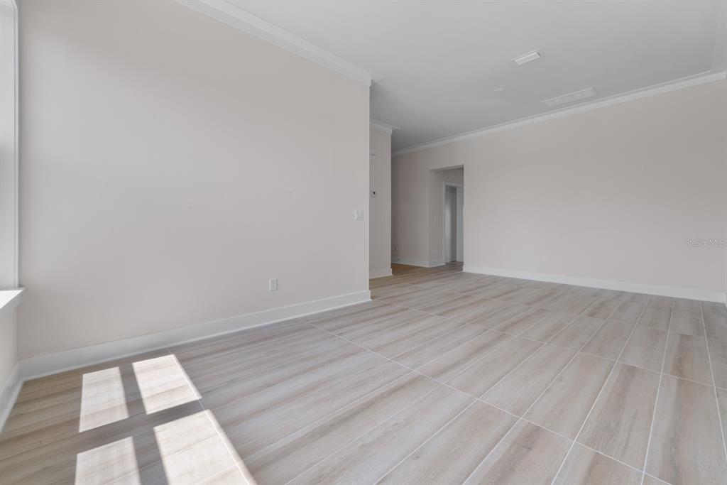 772 Gran Kaymen Way Apollo Beach, FL 33572 - Photo 12 of 35 wooden floor in a room