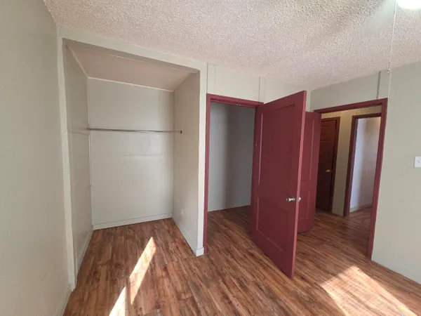 a view of bathroom with wooden floor