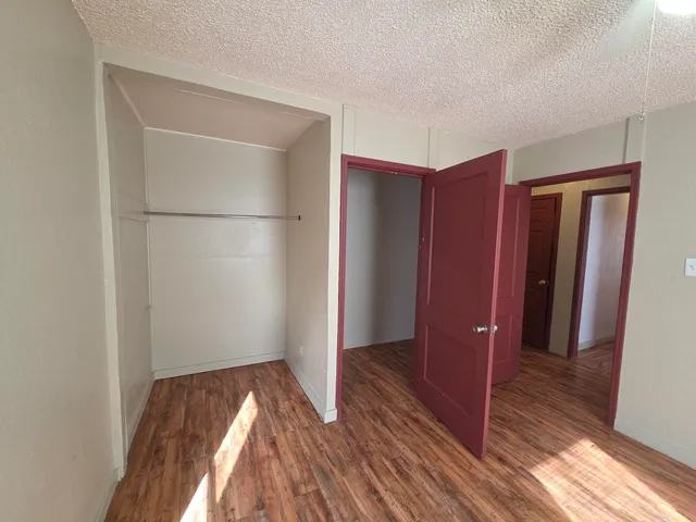 a view of bathroom with wooden floor