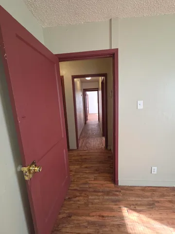 a view of a livingroom with wooden floor