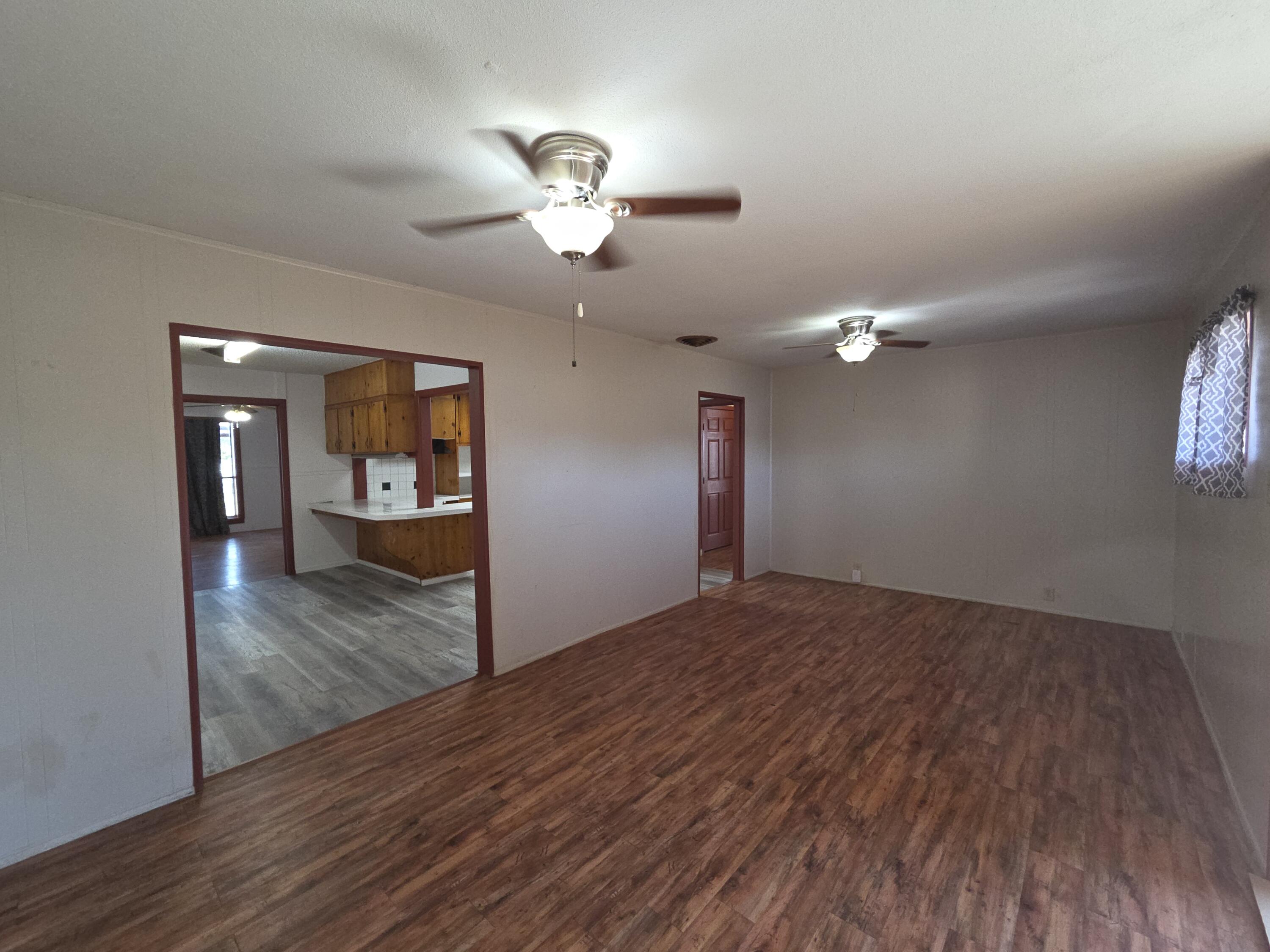 600 Vernon Plainview, TX 79072 - Photo 3 of 30 a view of empty room with wooden floor