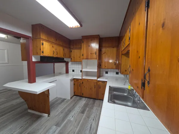 a large room with wooden floor