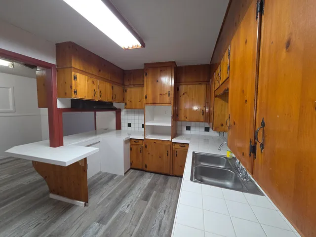 a large room with wooden floor