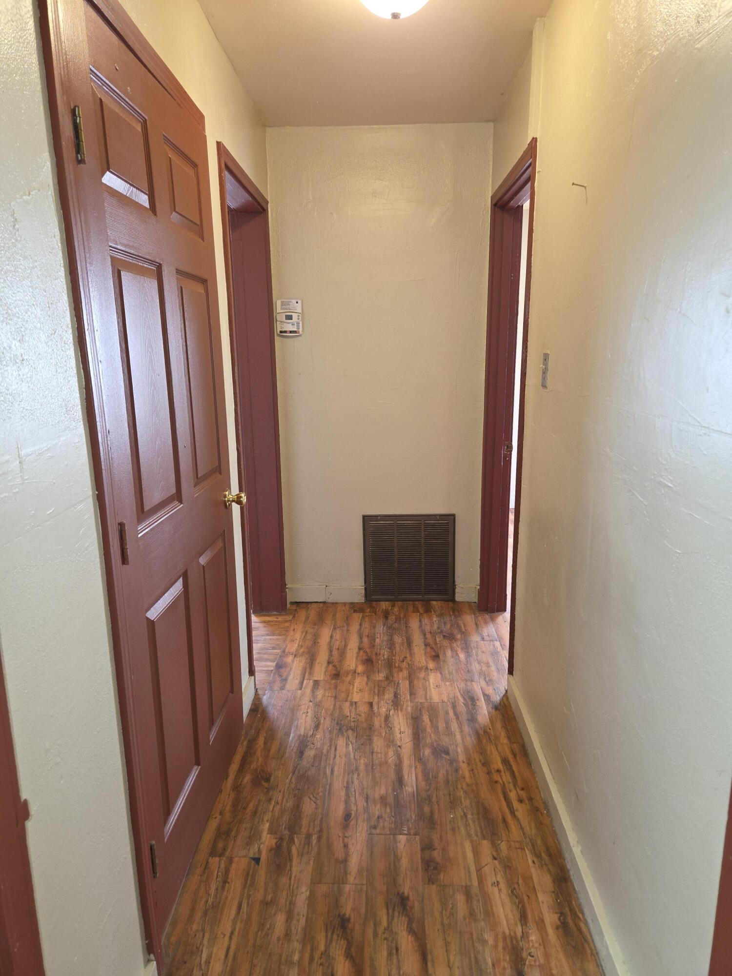 600 Vernon Plainview, TX 79072 - Photo 9 of 30 a view of wooden floor in a room