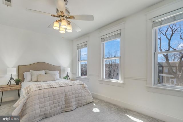 a bathroom with a sink and shower