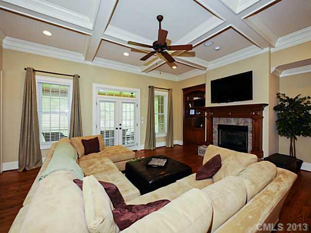 4132 River Oaks Road Clover, SC 29710 - Photo 3 of 16 a bedroom with a large bed and a fireplace