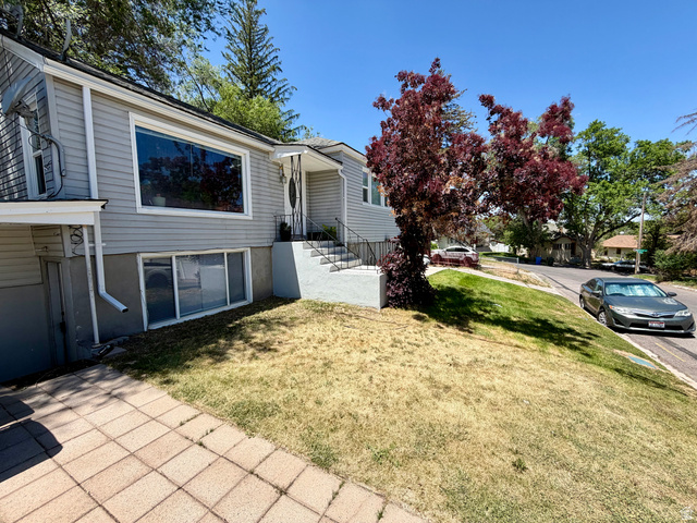 7 Foothill Boulevard Pocatello, ID 83204 - Photo 7 of 13 Split-level residence featuring gray horizontal siding and a large picture window