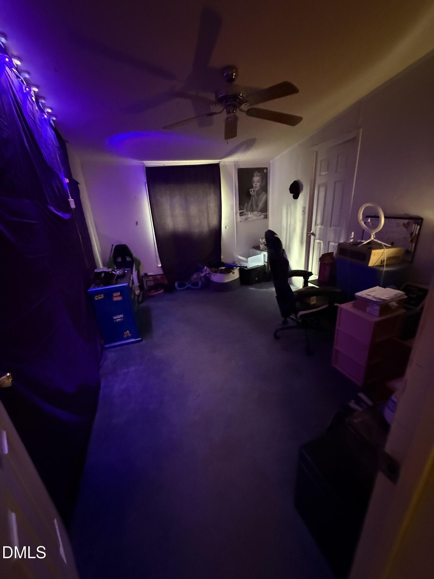 4749 Buckhorn Road Sanford, NC 27330 - Photo 16 of 18 a view of a room with gym equipment