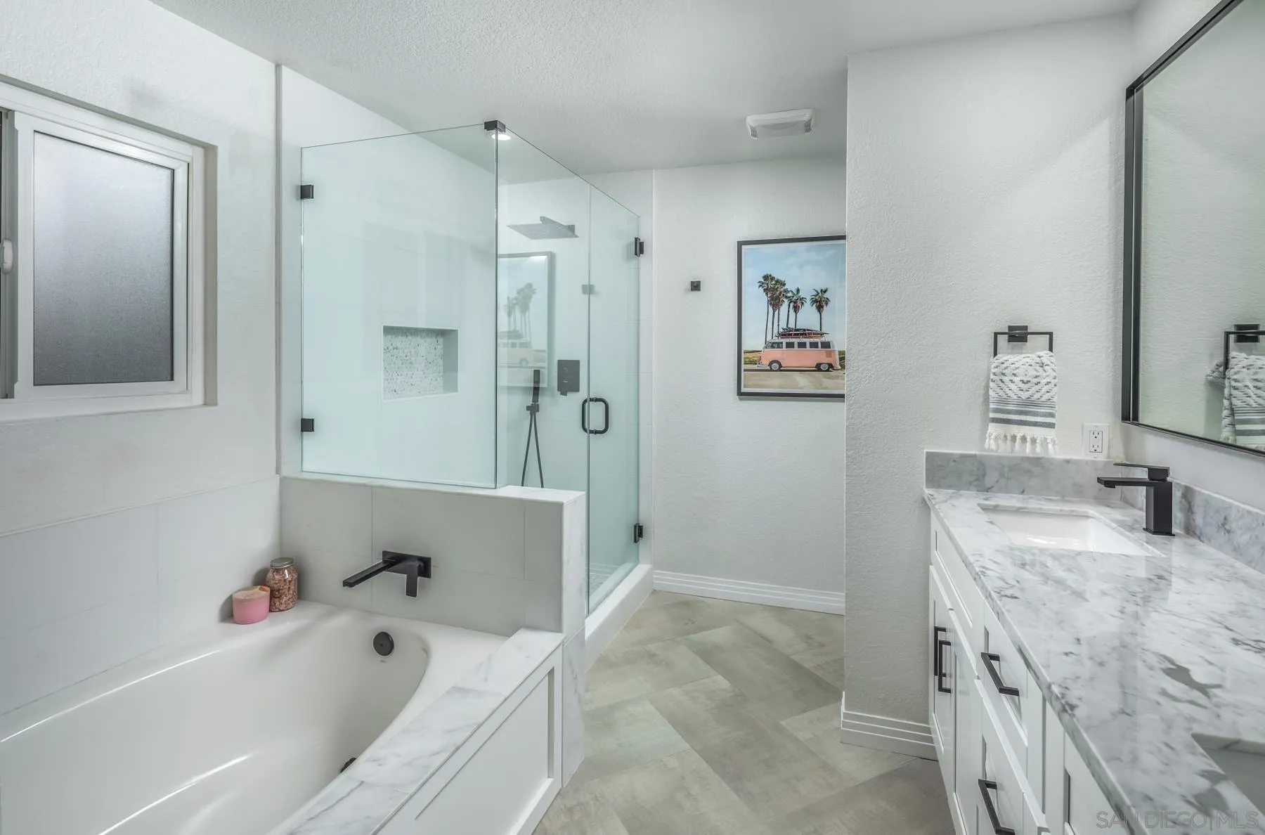 588 Melba Road Encinitas, CA 92024 - Photo 17 of 23 a bathroom with a tub sink and mirror